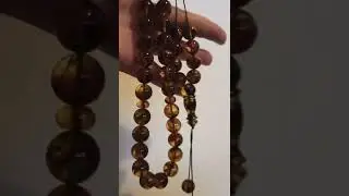 Baltic amber rosary.33 round beads + 2 at the end about  13 mm per bead.It's weight is 56 grammars