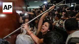 Protesters storm Mexico's Senate over a contentious plan to overhaul judiciary