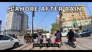 First Rain in Lahore 2026 | Bike Ride from Gulberg to DHA 🌧️🏍️