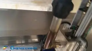 Shrink sleeve labeling machine for glass dropper bottle