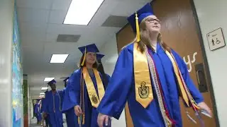 Broome High seniors walk halls of elementary school before graduation