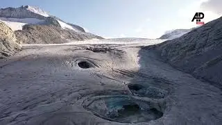 Warm weather melts Italian Alpine glaciers despite abundant spring snowfall