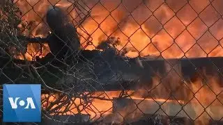 Firefighters Battle to Save Los Angeles-Area Homes