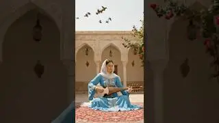 Afghan Woman Playing Rubab