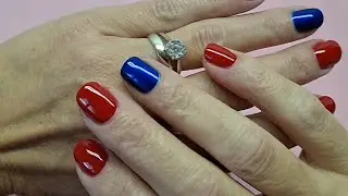 OPI 'Big Apple Red' accented with Essie 'Aruba Blue'