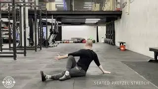 Seated Pretzel Stretch