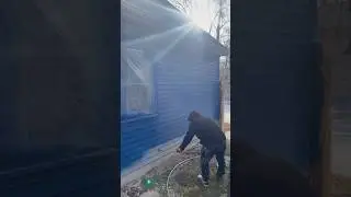 Spraying Aluminum Siding w/ SW Super Paint Low Luster in the color of (Salty Dog)