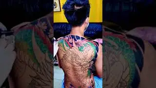 Colored Dragon Tattoo On Man Full Back