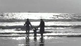 Zachary Harrison running on the Beach