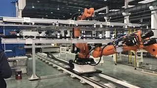 IMPIANTO ROBOTIZZATO PER LAMIERE DI GRANDI DIMENSIONI - ROBOTIZED SYSTEM FOR LARGE-SIZE METAL SHEETS