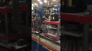 Duesenburg Tandem Flying-shear press system using registration probe