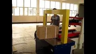 Automatic tape sealing and strapping machine for case sealer and strapper system
