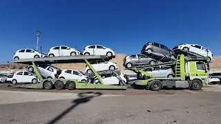 Loading 12 car transporter LOHR