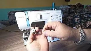 Швейная машина JANOME Q -23 G .