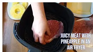 Juicy meat with pineapple in an air fryer