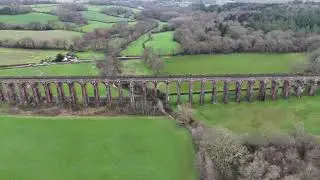 Bridge Over Green Fields: A Harmonious Landscape