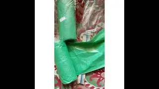 Biodegradable green garbage bags.