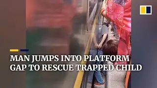 Man in China jumps into platform gap to rescue trapped child