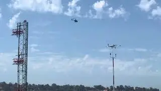 Robinson R44 Helicopter taking off from Torrance Airport