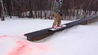 Grinding a box with a snowboard