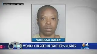 Woman charged in brother's murder