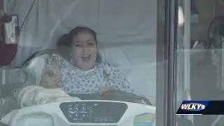 Ahead of her 49th surgery, friends surprise young girl outside Louisville hospital window