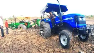 John Deere 5050 E stuck in Mud Pulled by Sonalika 60 Rx when raining so hard