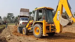 Dump Truck Unloading Mud in New Road and JCB Backhoe Leveling Road - JCB Machine Making Road