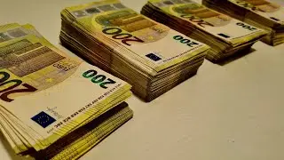 Counting money. Lots of cash !!!