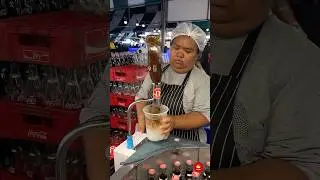 Cool Down with Slushy Coke at A Buzzing Bangkok Night Market.