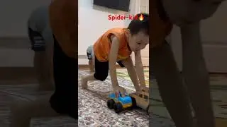 Spider-kid play in toy cars