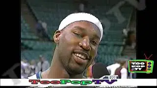 Baron Davis chats postgame with Gil McGregor. (2002)