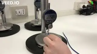 Stativo con comparatore e dinamometro per crimpatura
