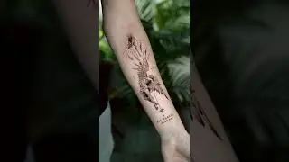 Cool angel tattoo by Andrea Mastink