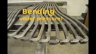 Bending steel posts on hydraulic press.