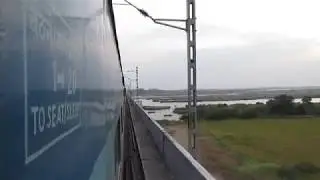 12164 DADAR SF Express crossing Tungabhadra River near Mantralayam Road railway station!