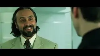Neo discusses with Rama-Kandra and the Trainman