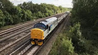 Europhoenix 37901 &ldquo;Mirless Pioneer&rdquo; drags Thameslink 700106 through Salfords - 16/9/24