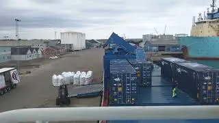 Cargo vessel Baltic Amelie arriving and loading in port of Grenaa, Denmark