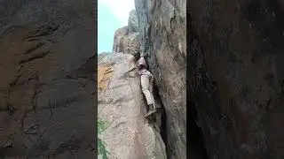 Travel guide in Africa climbing rocks. #localtour#travel#kenyatravelvlog