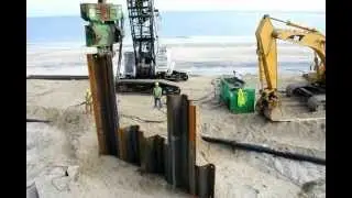 Indian River Inlet bridge sand project under way.