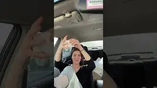 Girl Showing Her Socks and Feet in Her Car 