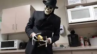 Skeleton Mobster struggles to open talenti&trade; jar then steps on a Lego&trade; and is rattled.