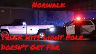 Truck Hits Light Pole In Norwalk