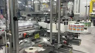 High Speed Front Back Labeling of Juice Containers - Zero Downtime