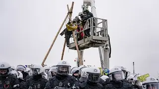 Anti Coal Mine Activists in L&uuml;tzerath, Germany Construct Tripod in Front of Police Line