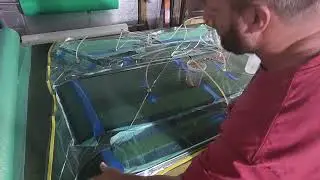 Carbon fiber vacuum infusion, using an envelope bag technique.