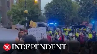 Clashes between protesters and police outside Iranian embassy in London