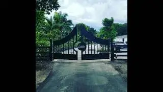 Miami Swing Gate Opener Installation. Double LiftMaster LA500 available at gatemotorsunlimited.com