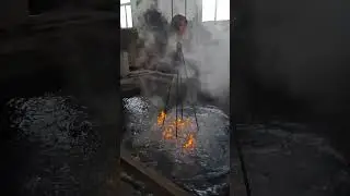 Red-hot metal being submerged into a liquid bath #forging #quenching